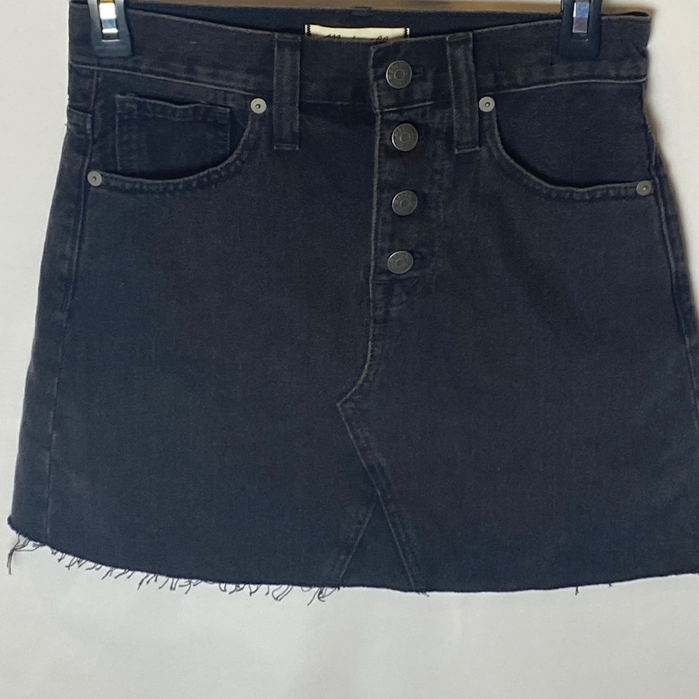 Madewel black denim mini skirt, four button fly, raw edge hem; Women’s size 23